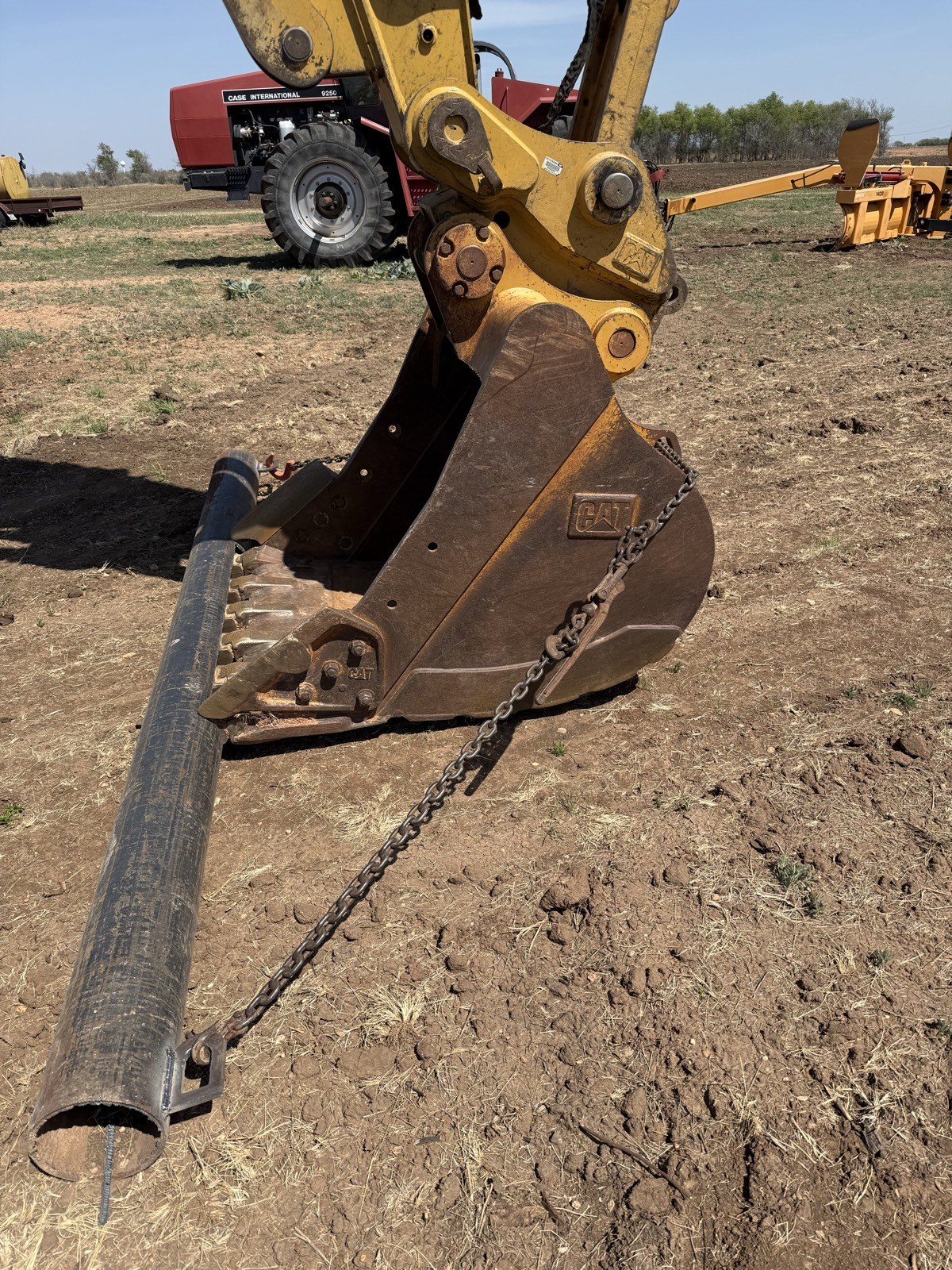 Excavator bucket and thumb attachment detail