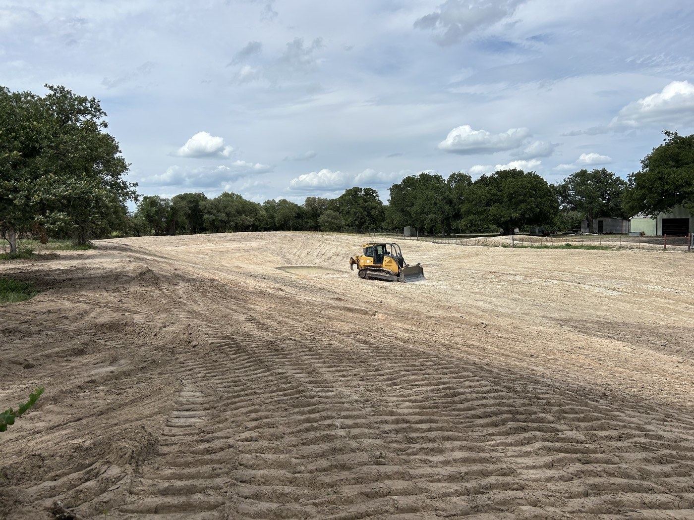 Dozer leveling a cleared building site