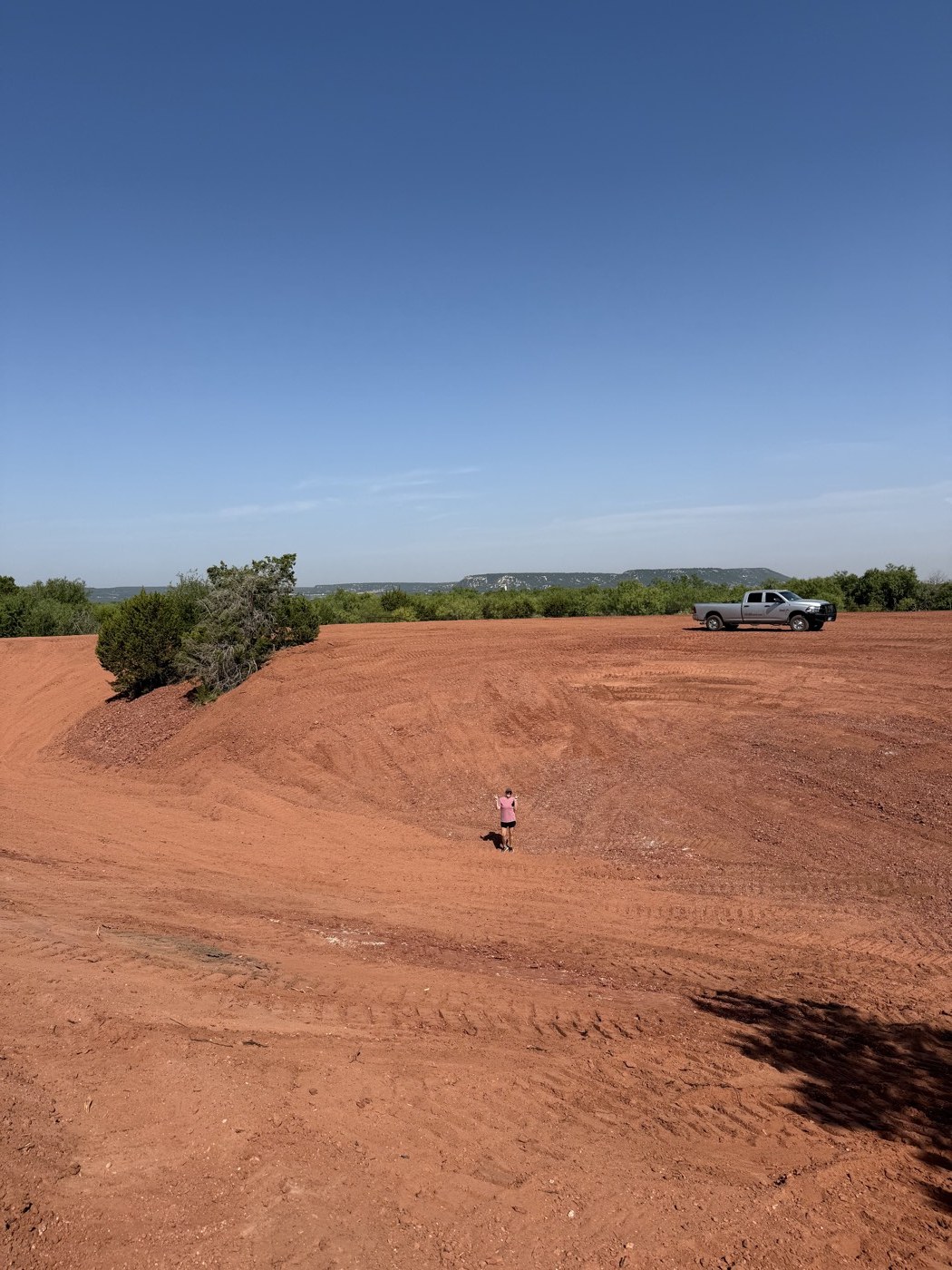 Pond basin shaped and graded on site