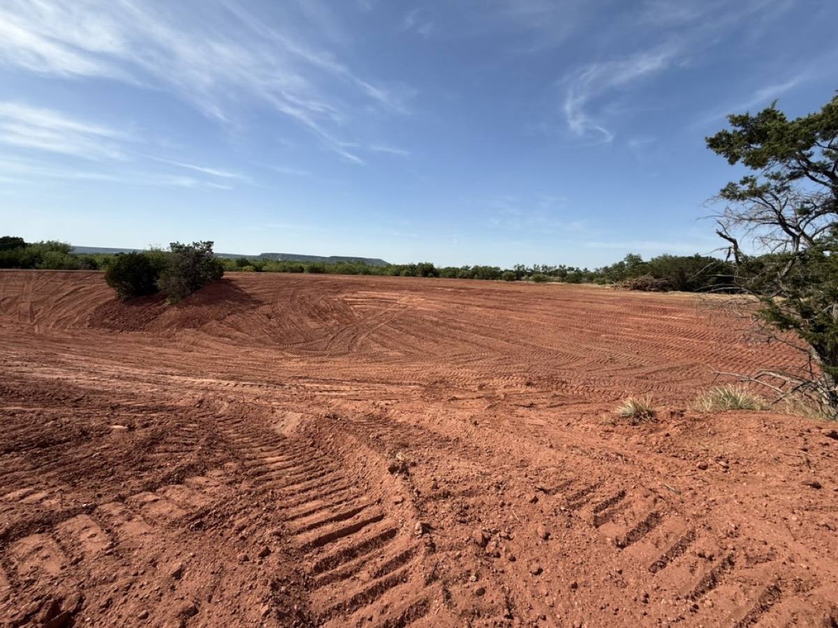 Pond basin excavated and graded, ready for water