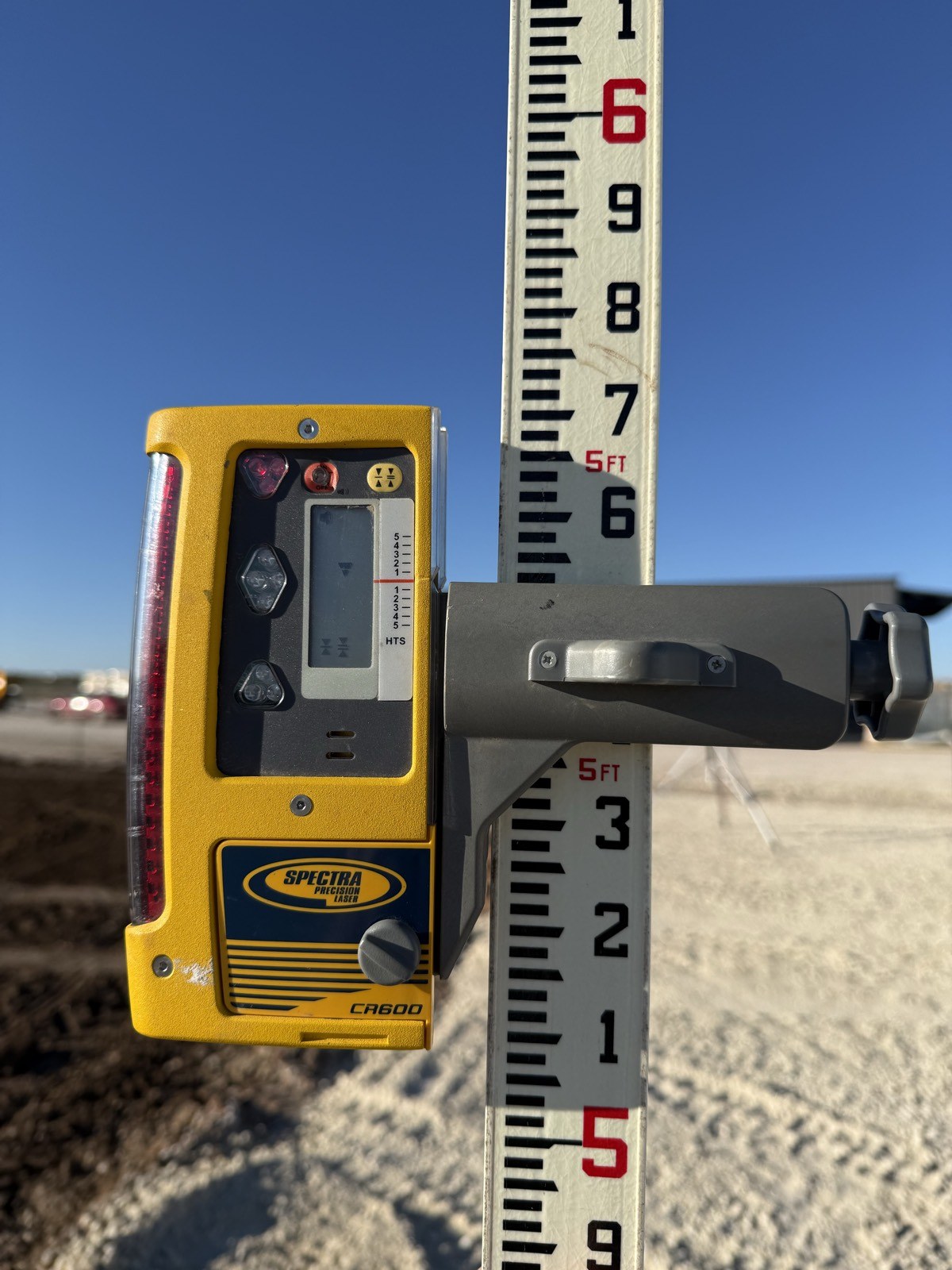 Laser grade control receiver and grade rod detail